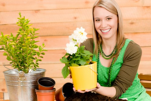 Professional landscaper maintaining a Richmond garden